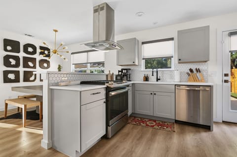 Whip up delicious meals effortlessly with modern appliances and ample counter space.