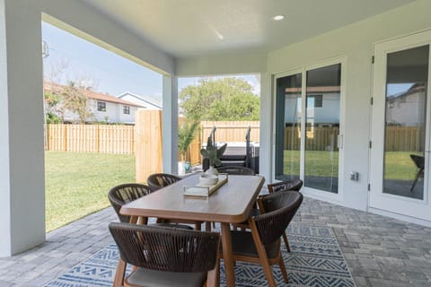 Enjoy outdoor dining and your private fenced in backyard