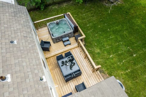 The large deck has outdoor seating for 6 at the table and the upper deck holds our largest hot tub, which is always clean, sanitized, hot and ready for your enjoyment, year-round.