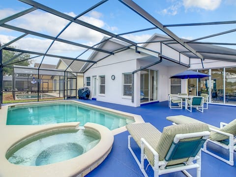 - Relax in your private screened in pool with soothing spa and sunny skies overhead
- Lounge in style on plush recliners or dine alfresco under the umbrella covered table
- Ideal for family fun, grilling, and peaceful mornings by the water