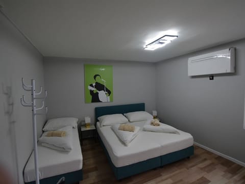 Dreibettzimmer Ohne Storno - Hotel Mittelpunkt Villach House in Villach