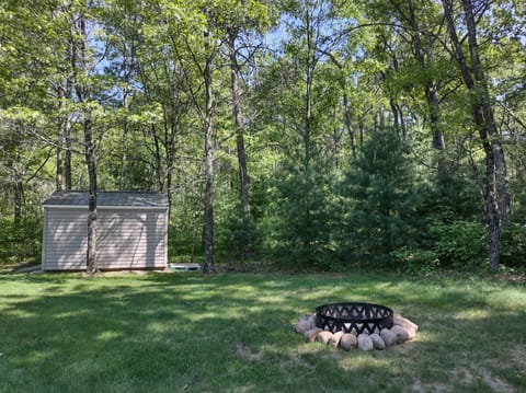 Firepit in the private backyard.  Firewood is provided onsite.