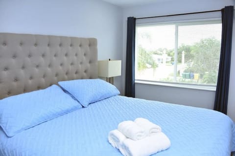 Large bedroom with King size bed with excellent mattress and walk in closet. 