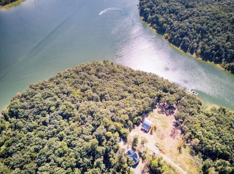 drone view of house and cove