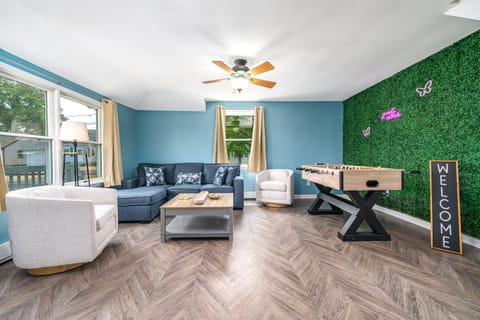 Welcome to the living room. Has a Foosball table, board games and cable TV! 