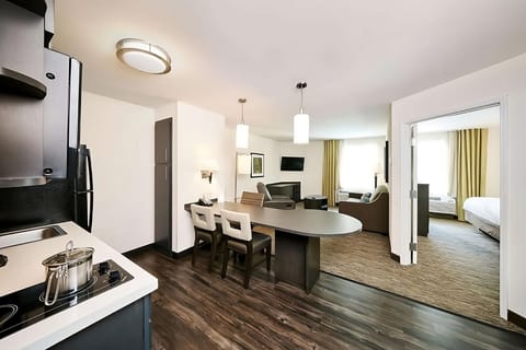 Spread out with open-plan dining, lounge, and private bedroom.
