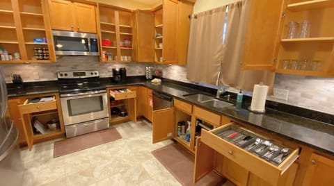 The kitchen is very well stocked for all of your cooking and dining needs.