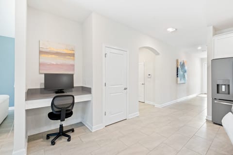 The house features a dedicated workspace, perfect for getting work done even while on holiday