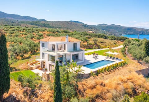 The villa is nestled on a slope overlooking Kalamata bay