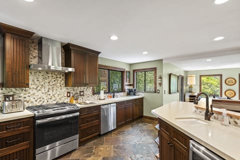 New, stainless steel appliances throughout the kitchen.