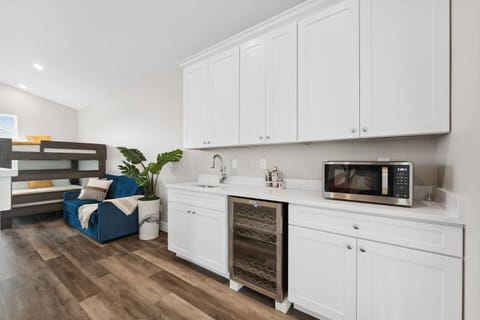 3rd FL wet bar with mini fridge.