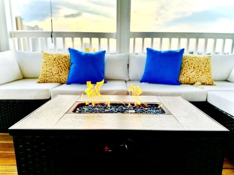 Third FL deck with outdoor seating and fire pit.