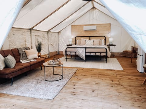Enjoy 320 sq. ft in our beautifully outfitted treehouse safari tent.