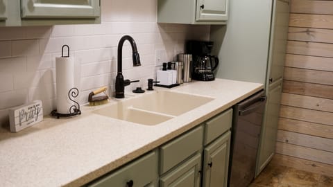 Kitchen- coffee pot, baking dishes, utensils, spices, dishwasher tablets, etc. 