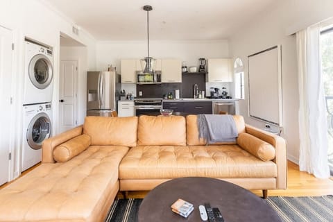 Comfy living room overlooking University Avenue and the new Santa Fe Blount Center.
