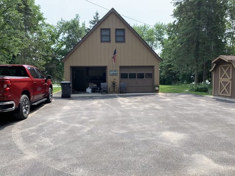 Large driveway with room for toys on trailers. Easy access to outside outlet