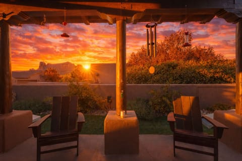 The glow, the quiet, red rocks at sunset, pull up a chair and stay.