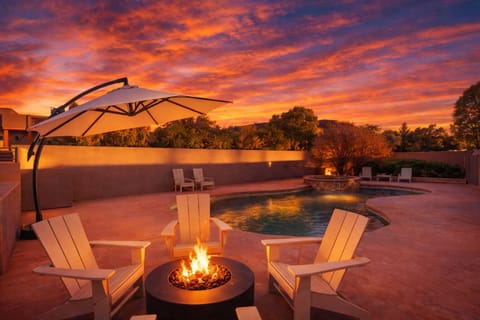 End the day poolside by the fire as red rocks glow and the desert grows quiet.