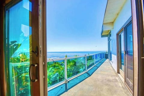 Step out onto the wraparound balcony from the master bedroom and soak in panoramic views, offering the perfect spot to unwind and enjoy the surroundings.