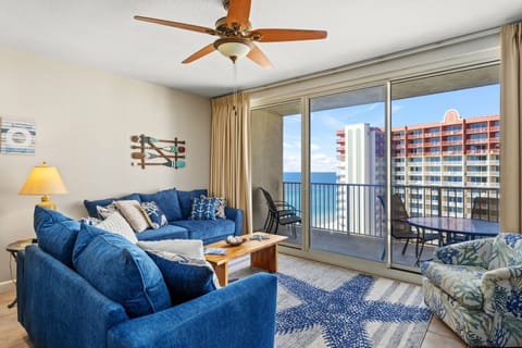 Bright living room with Gulf views, Smart TV, and sleeper sofa — perfect for relaxing after beach days
