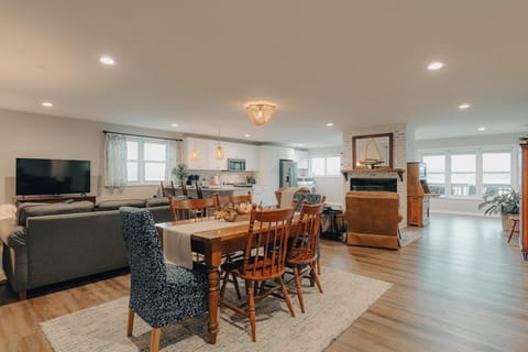 Upon entering the house, the lake greets you from the large windows opposite the front door.  It's a very open concept. 