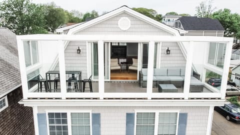 Enjoy the amazing views of the beach and water on the third floor patio 