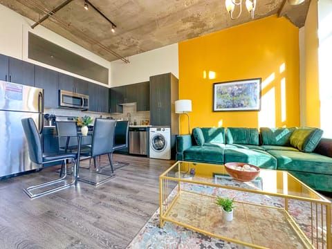 Spacious living room with a lot of daylight and large windows.
