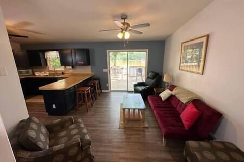 Family room with lake view and another futon
