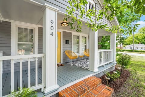 Front Porch with beautiful yellow decor