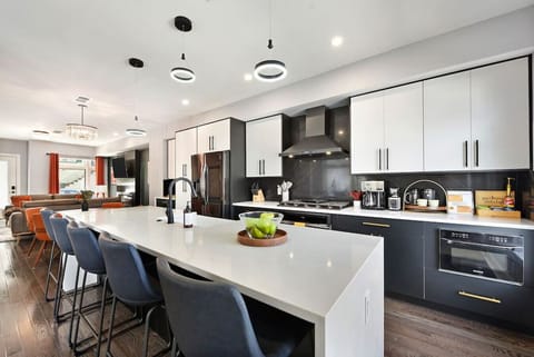 Modern kitchen with sleek design, perfect for preparing meals