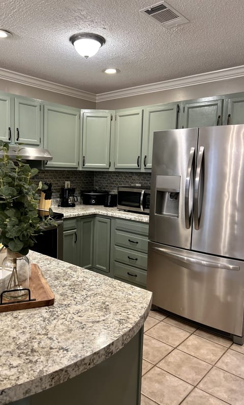 Natural Tone Kitchen with stainless steel appliances
