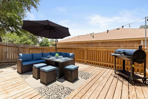 Escape to our tranquil backyard oasis, complete with stylish outdoor furniture for lounging and enjoying the fresh air.
