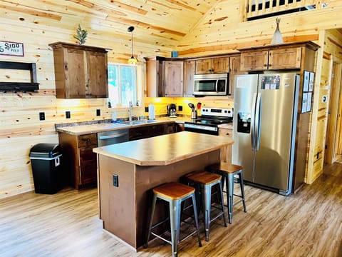 Full kitchen with large center island. 