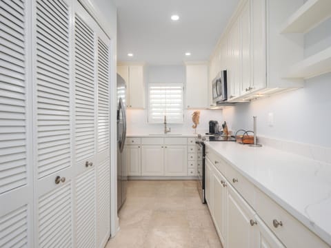 Fully Equipped Kitchen with Stainless Steel Appliances