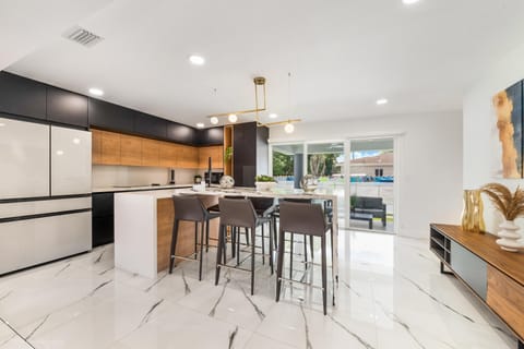 Experience the pinnacle of culinary elegance in our trendy island dining room 