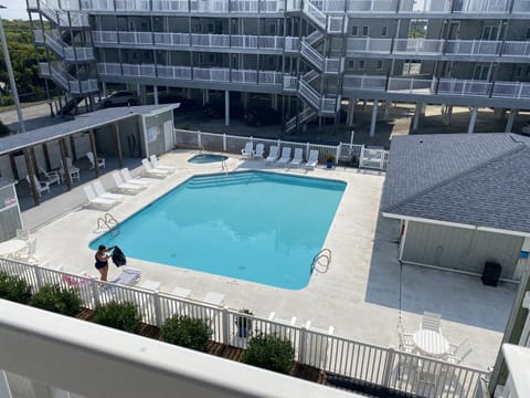Pool view from condo's front door access area.