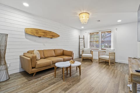 Stylish living room with comfortable leather sofa.