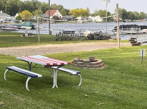 HOA common grounds beach area and volleyball court. There’s a sandbox also 