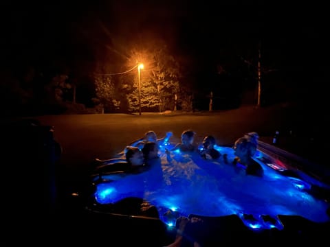 Enjoy the 8 person hot tub located right off the back deck