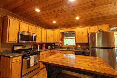 Fully equipped kitchen with gas stove & stainless steel appliances