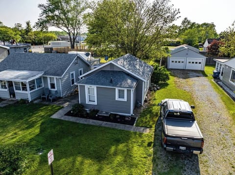 Parking for one car in driveway (where truck is parked).  Small backyard and fire pit also around the house.