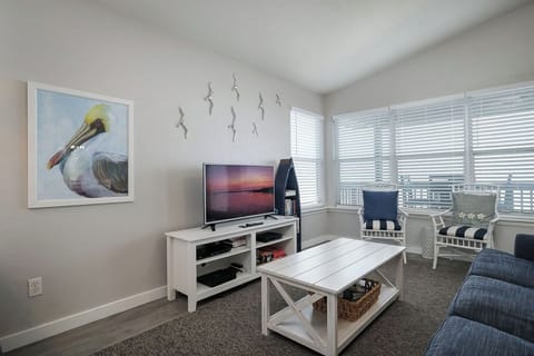 Bright and open living room that greets you with stunning Gulf views!