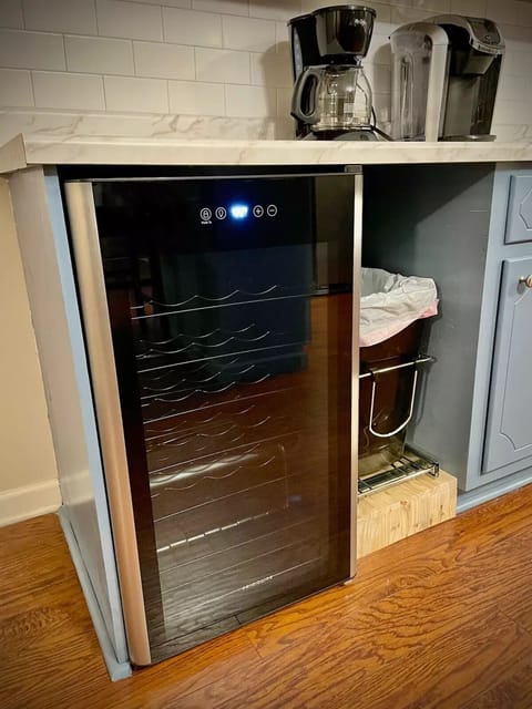 Wine cooler and 2 coffee makers. Drip coffee and K-cup.