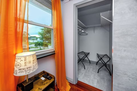 orange bedroom's walk in closet