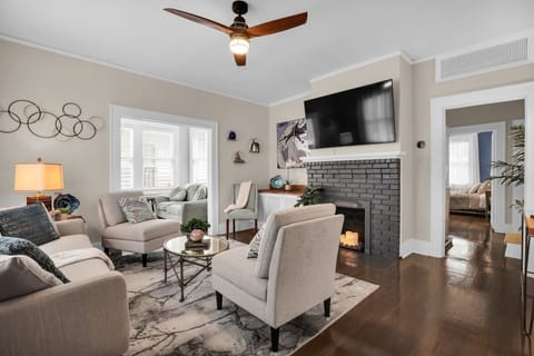 Welcome home!  The cozy living room greets you as you enter the property.  Also, perfect for move night!