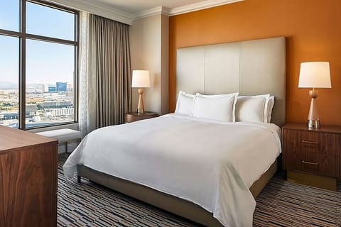 Unwind beside expansive windows and drift into deep comfort.
