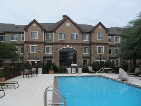 Dive into a refreshing swim in this spacious outdoor pool.