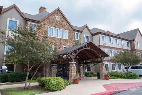 Arrive with ease under the covered entrance and warm welcome.