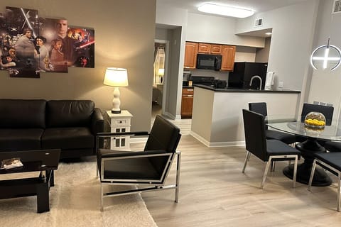 The living room, kitchen, and dining room are close to each other.