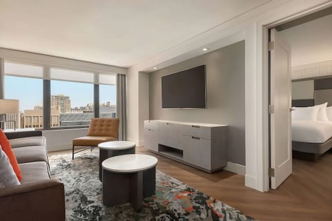 Lounge by the window and enjoy the city skyline.